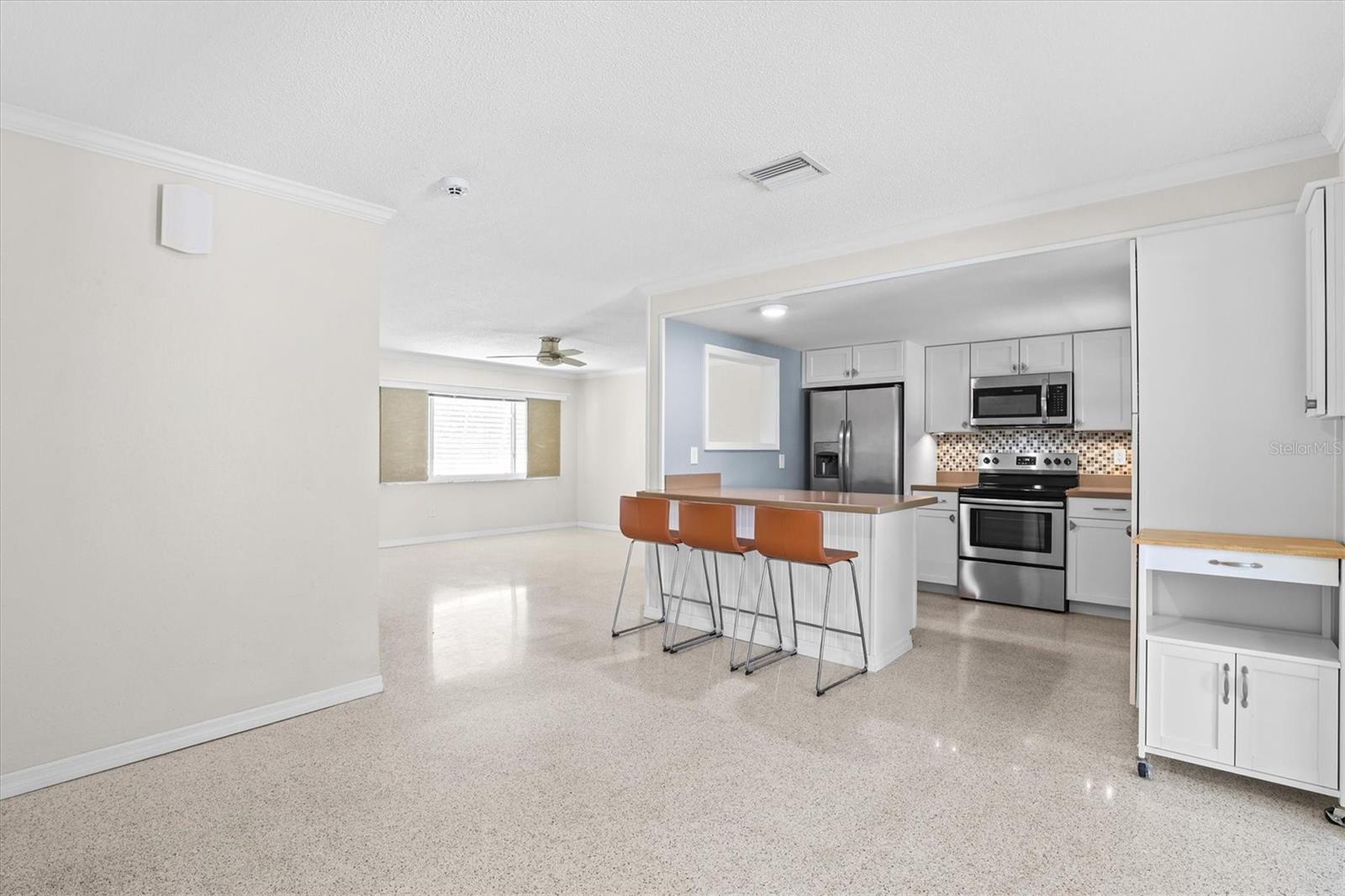 Seamless kitchen and dining area perfect for hosting and daily living