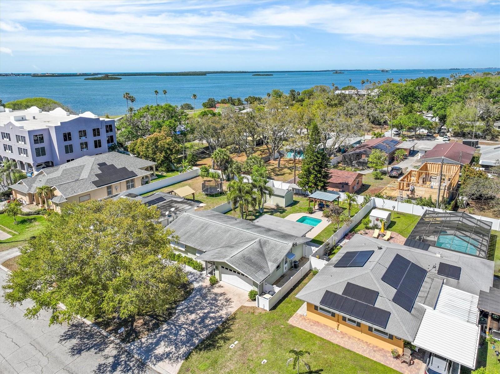 Aerial views highlighting proximity to waterfront, parks, and surrounding amenities