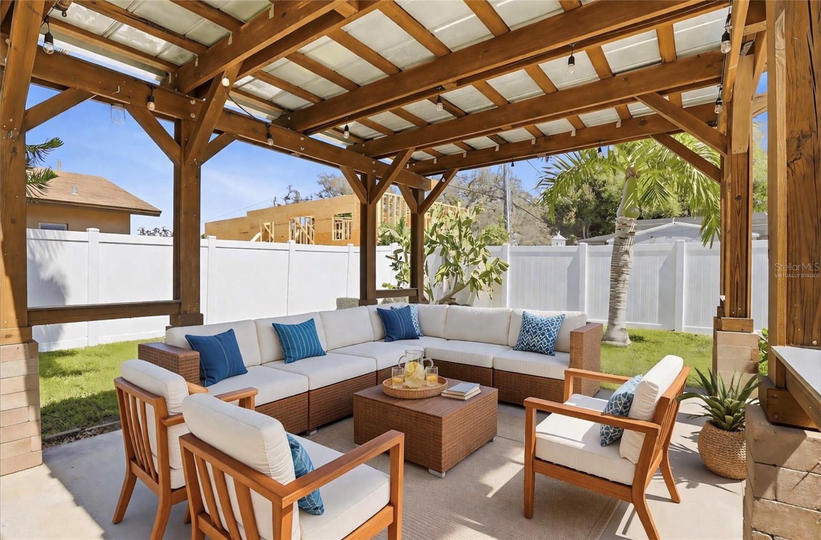 Covered lanai perfect for outdoor dining and relaxing year-round