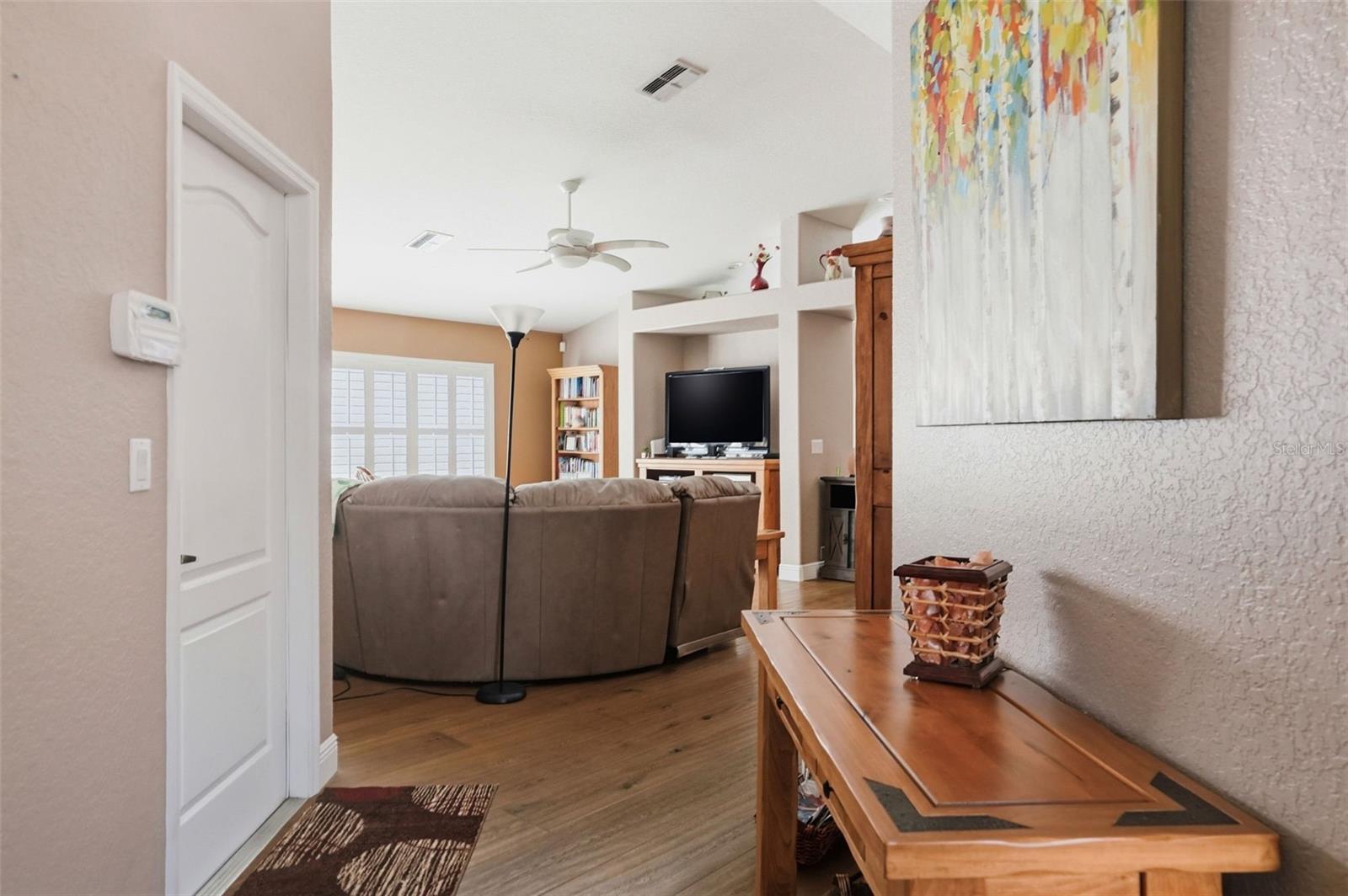 Front entry with door to garage