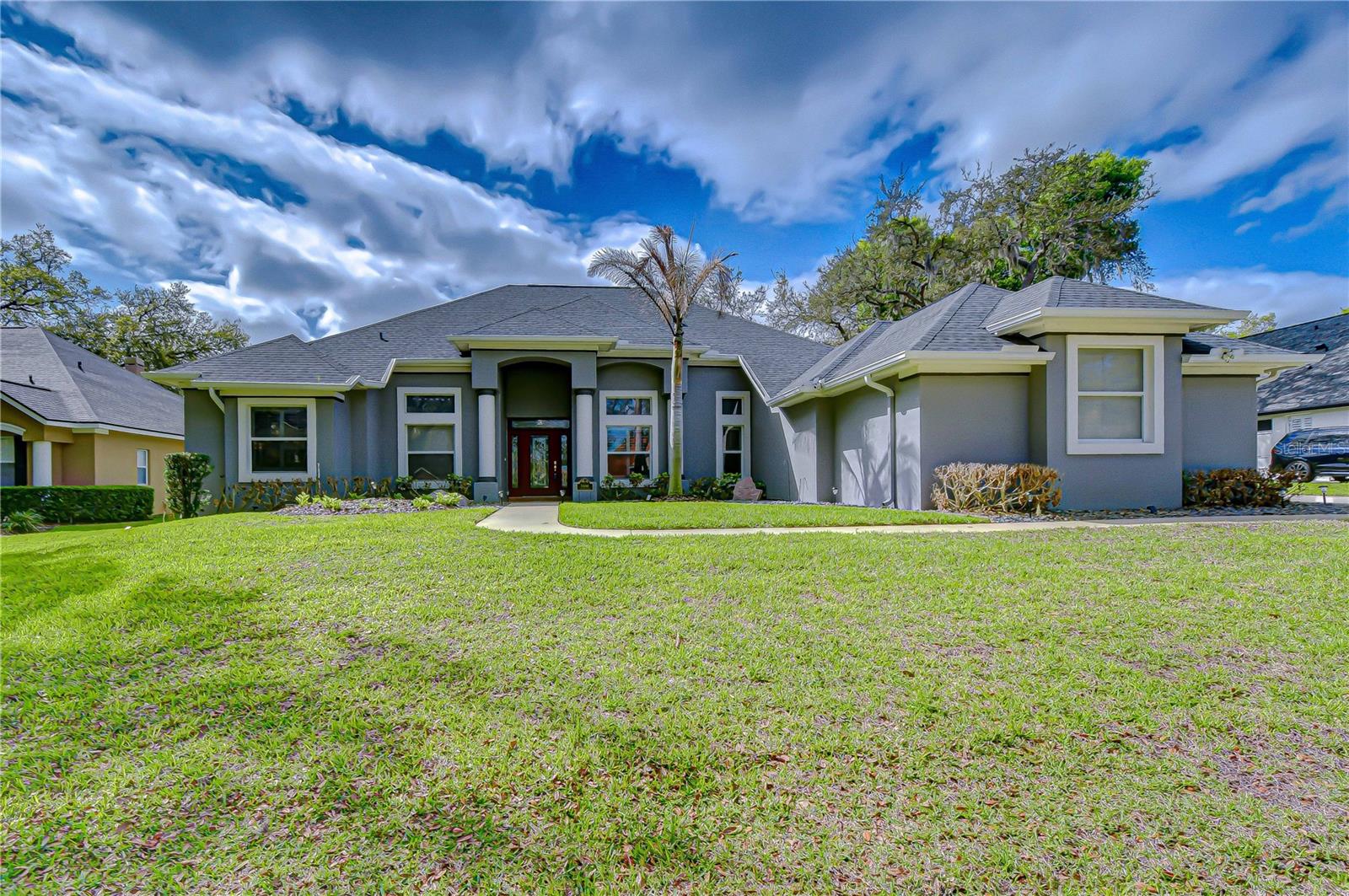 Beautifully maintained 4-bedroom home in the gated community of Canterbury Oaks.