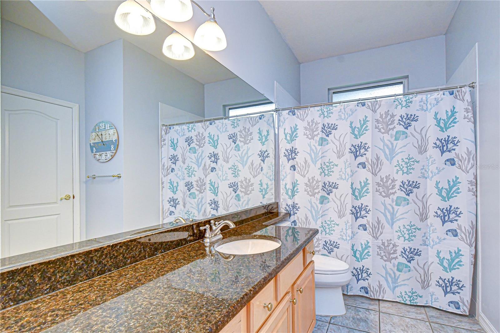 Convenient shared bathroom between bedrooms.