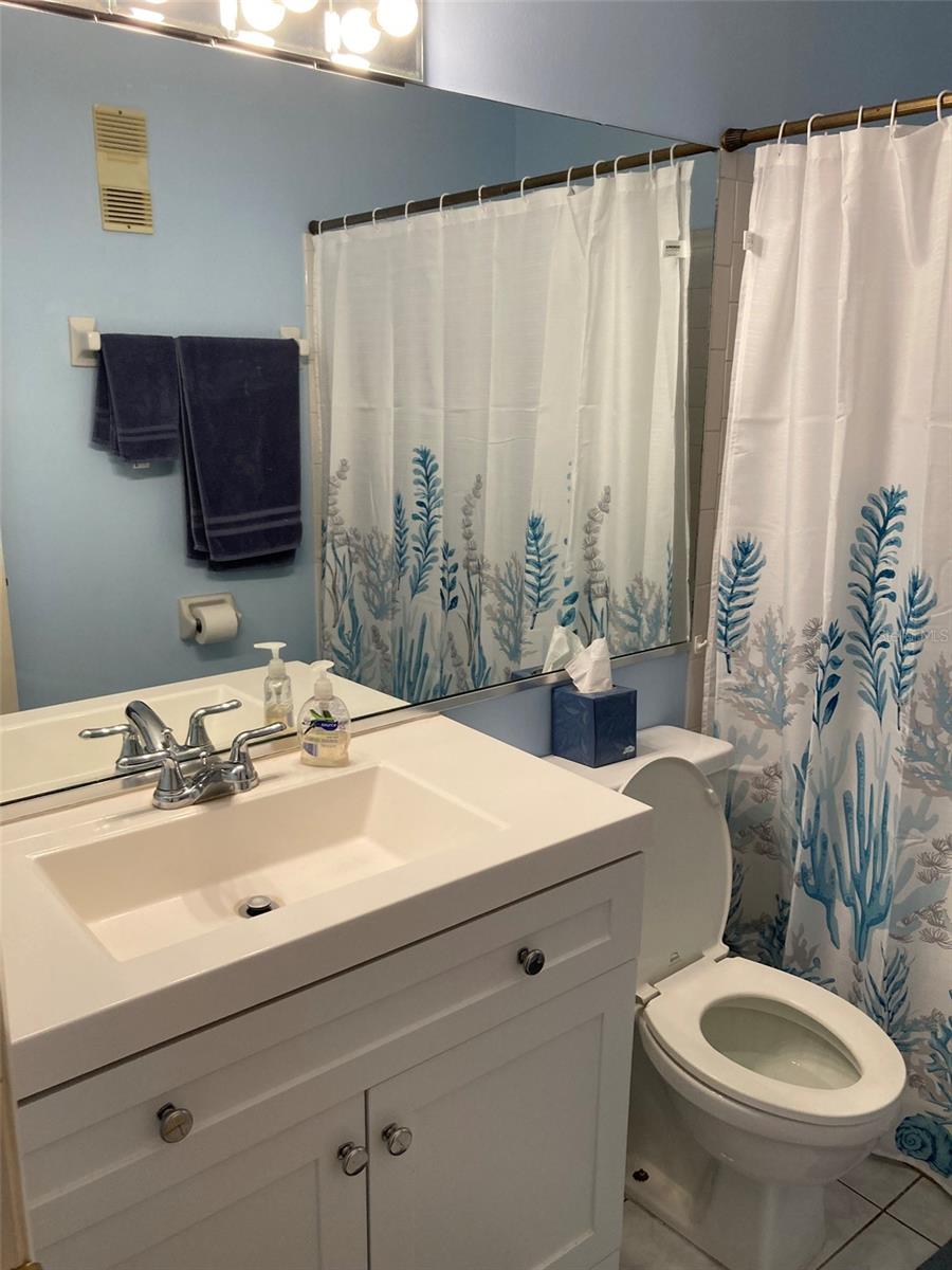 En-suite bath with shower only