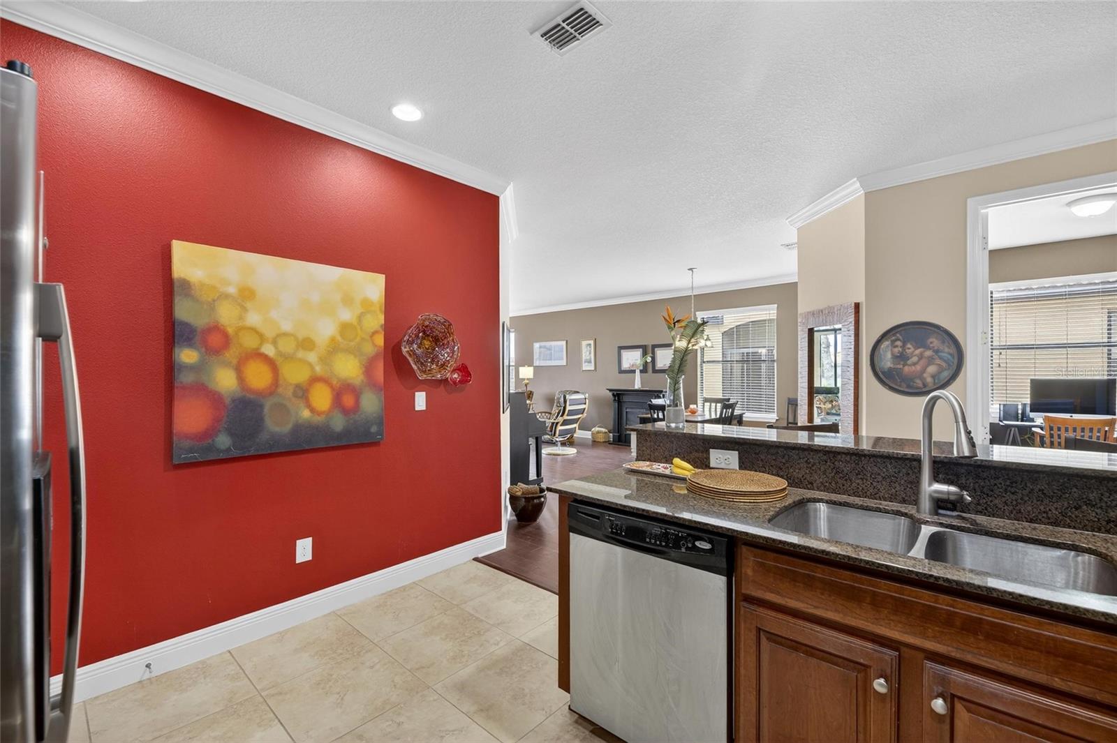Looking out from the kitchen. The den/study is opposite the kitchen and the living/dining combination is beyond the the kitchen and office.