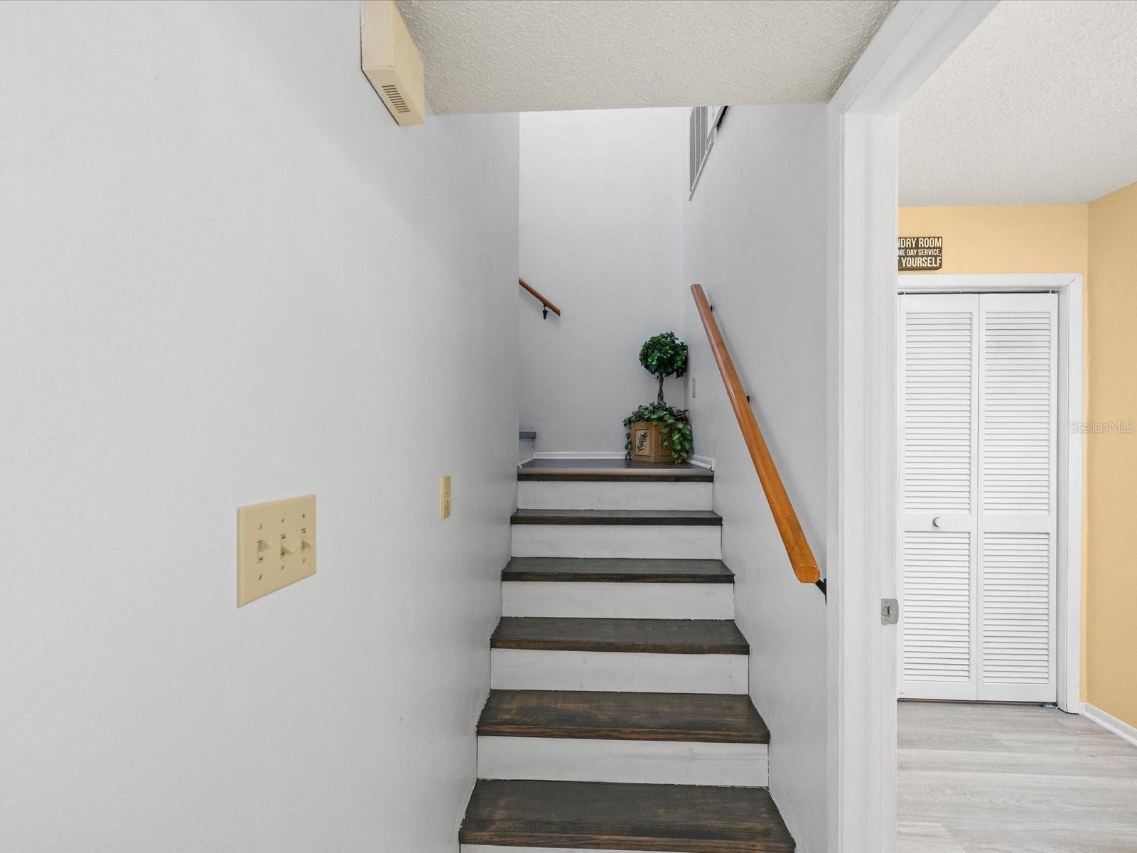 Stairs leading to the second Primary Bedroom