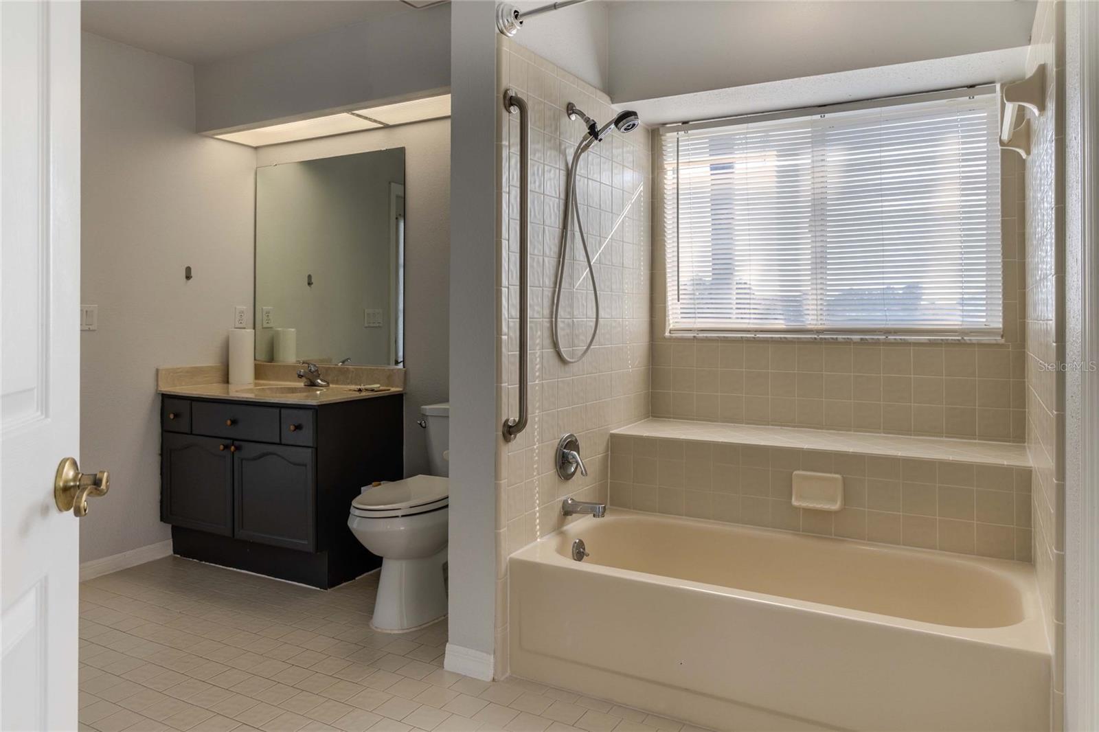 2nd Bathroom with Pool/Lanai Access