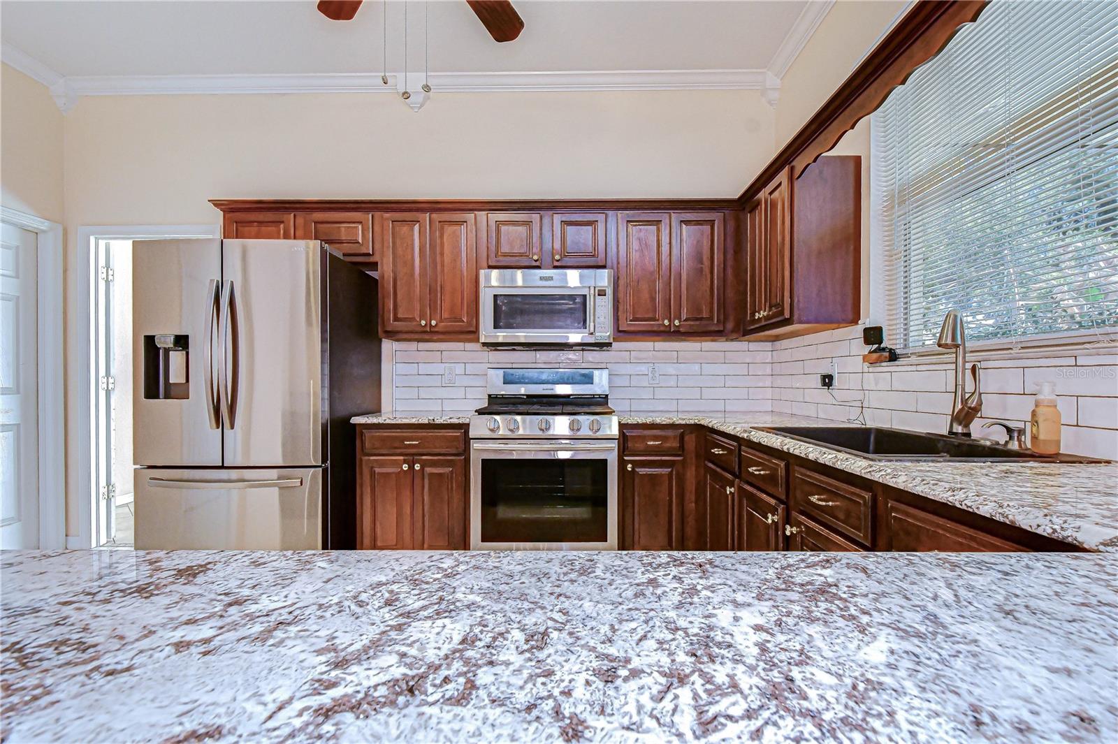 Crown molding & window add dimension.