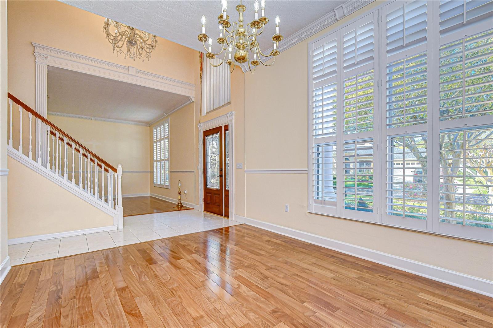 Formal dining room with oversized window.