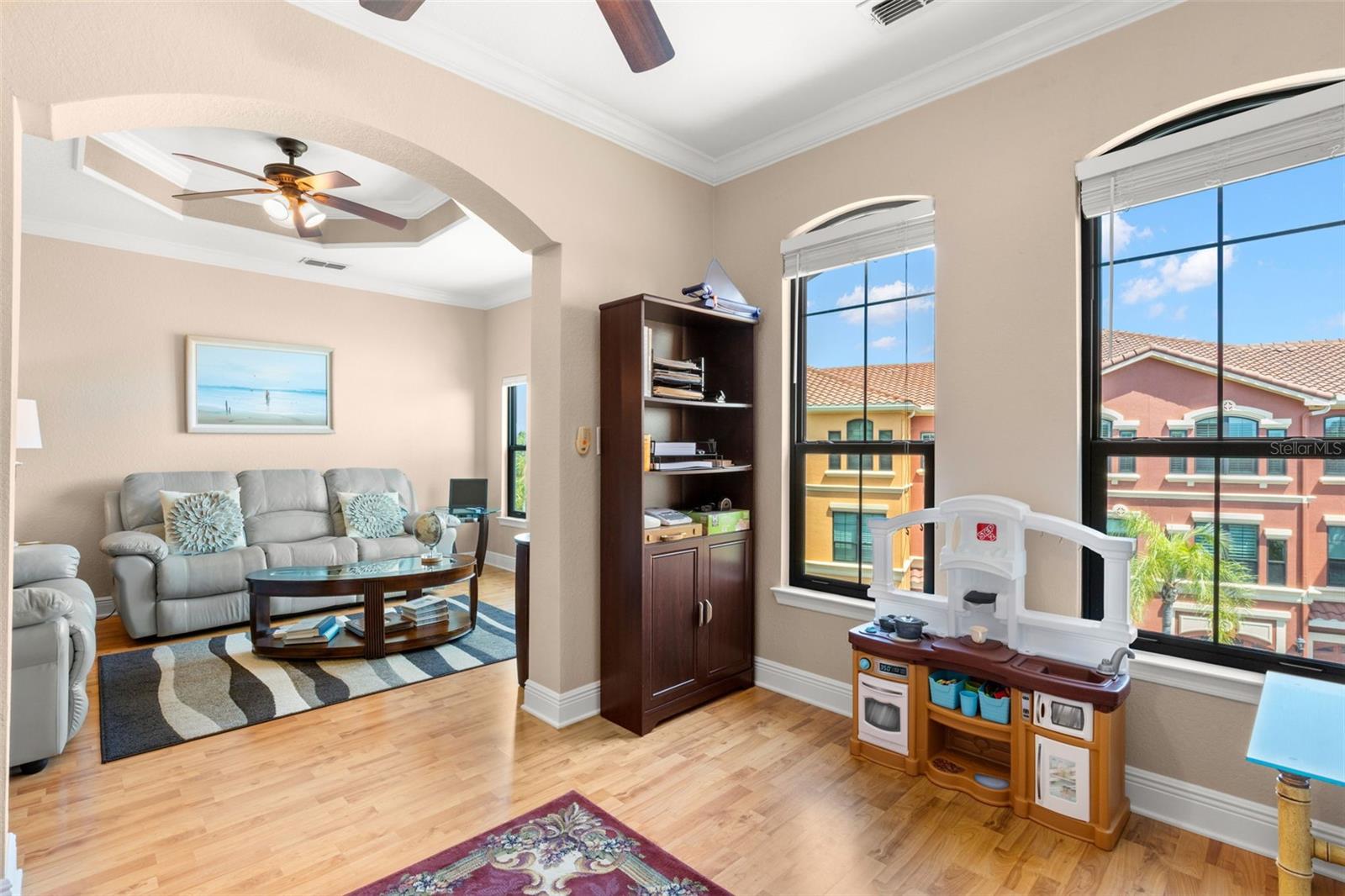 This additional room provides versatility for a home office, study, or creative space.