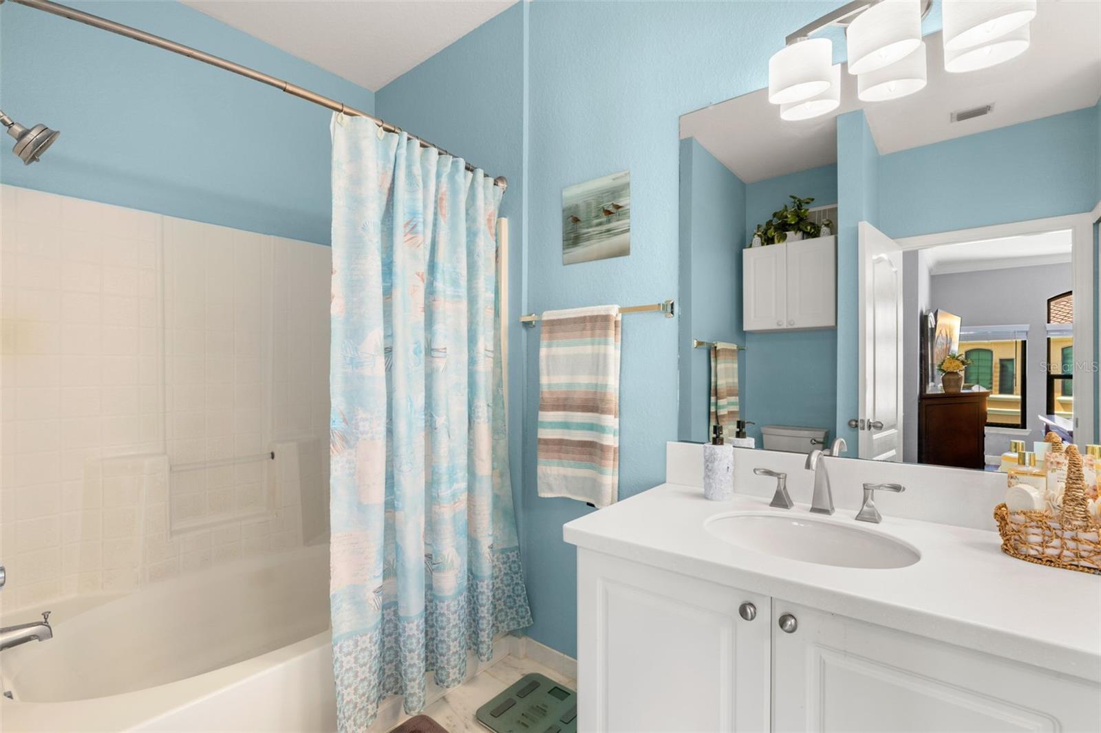 A full bath layout with a tub/shower combination adds everyday practicality.