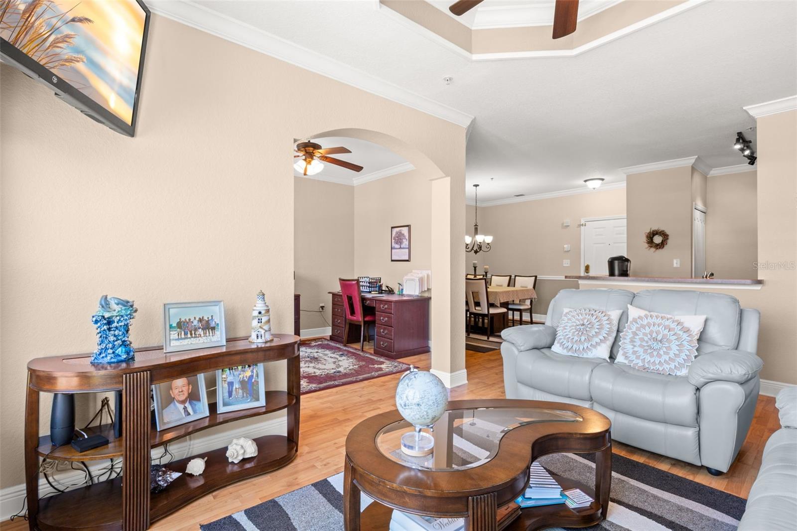 The layout flows seamlessly into a versatile space—ideal for a home office, den, or additional living area.