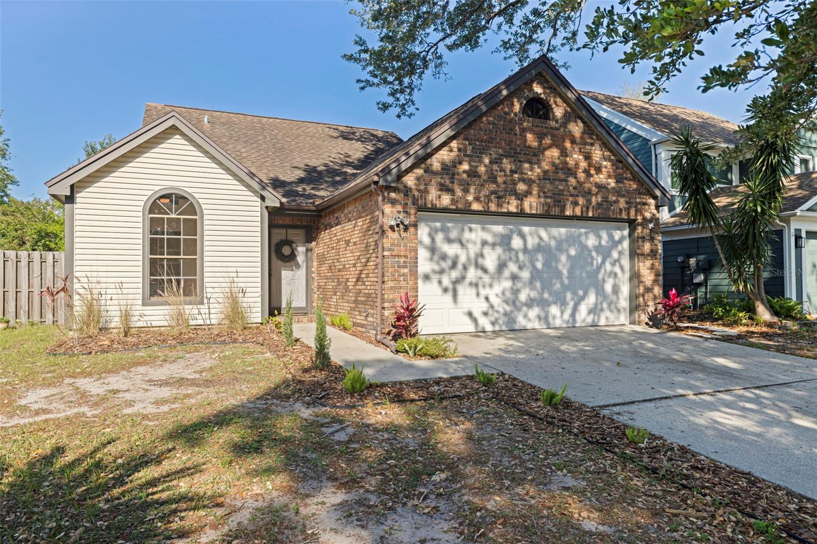 2 car garage and drive way for multiple cars