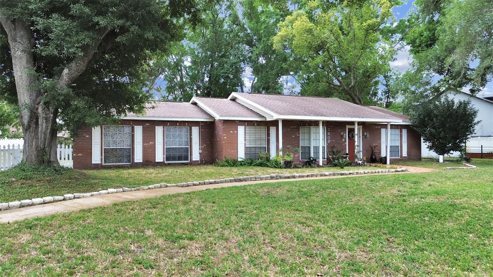 spacious pool home in Pat Acres on 1/2 acre lot