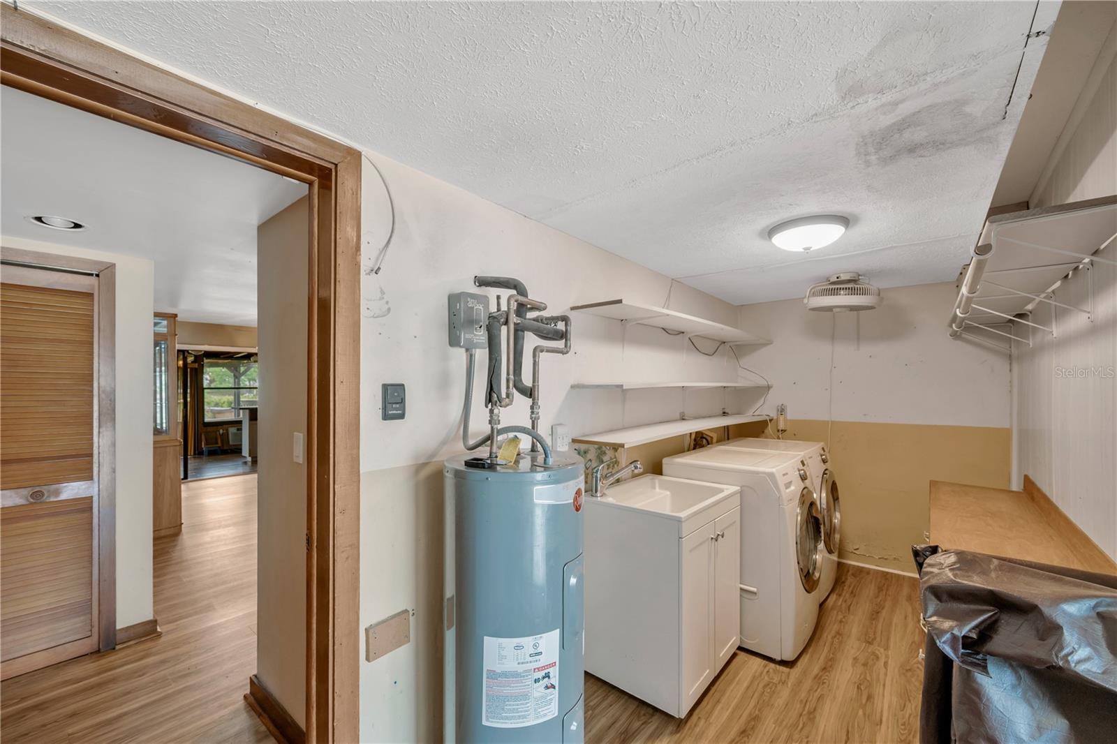 Indoor Laundry Room With New Water Heater