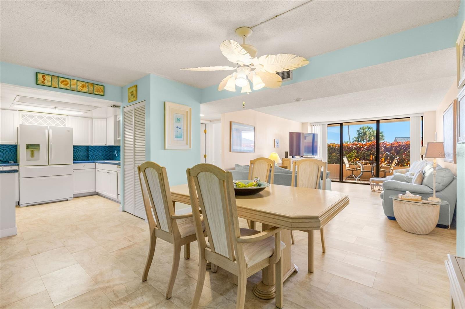 Dining Area is the focal point between the kitchen and Living AreaS (inside AND out!)