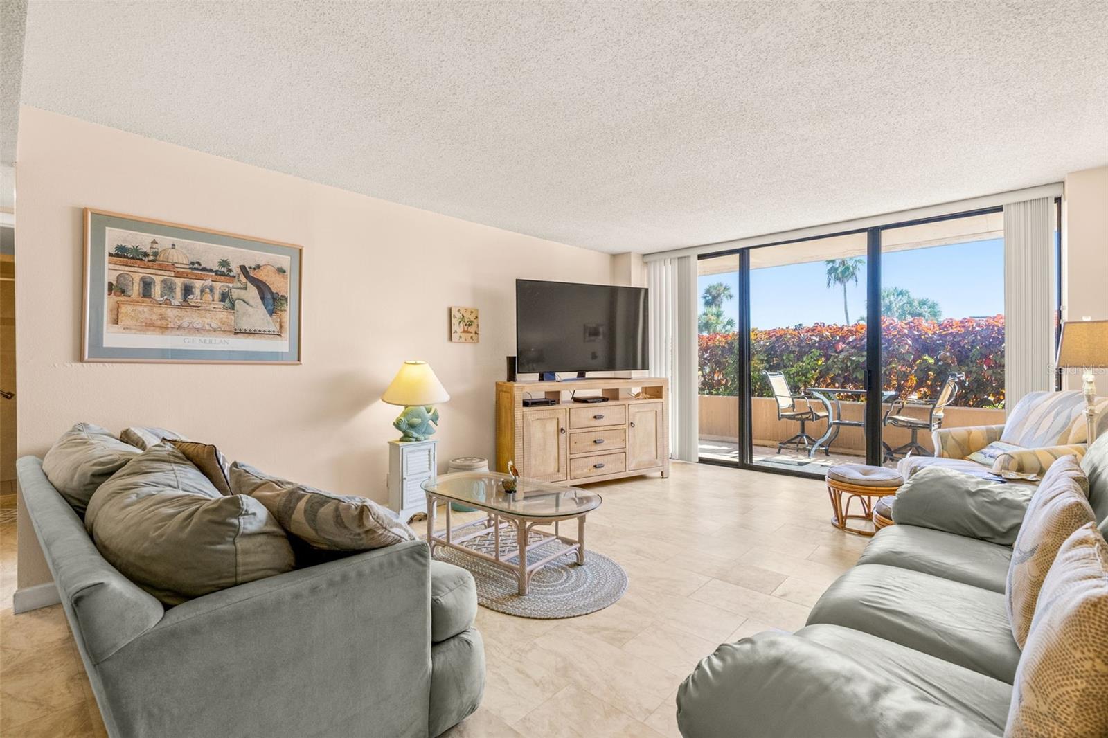 Living Room View - also showing one of the three accesses to Patio and Plaza Deck - which leads directly to POOL. Spa, etc....no lobby, elevator or stairs needed!