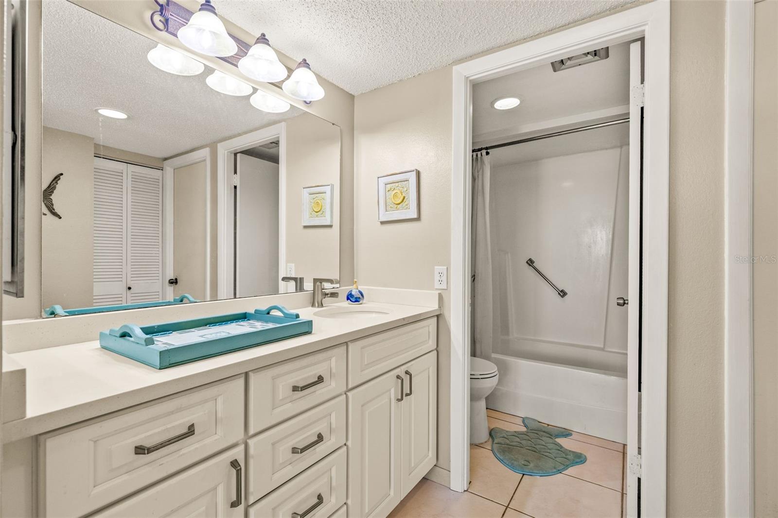 Master Bath - provides a LARGE Dressing Area with Walk in Closet