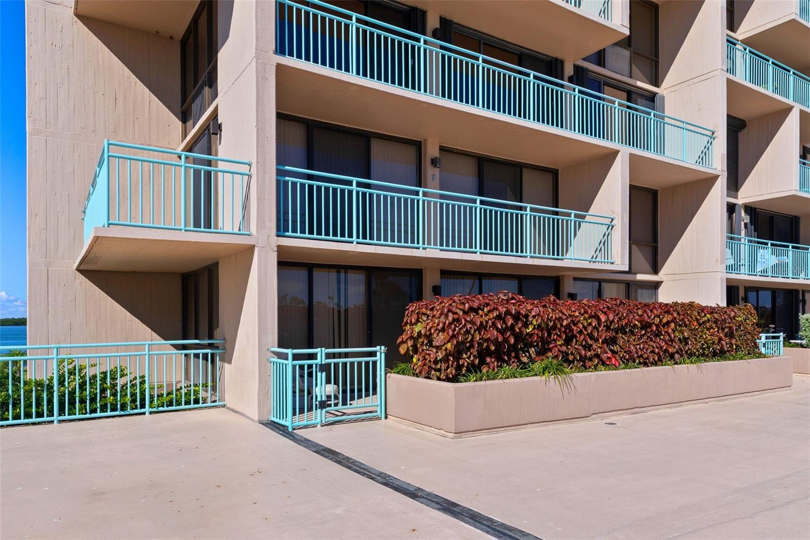 your private Terrace is behind the hedge - offering IMMEDIATE access to Tiki Hut and POOL / Spa