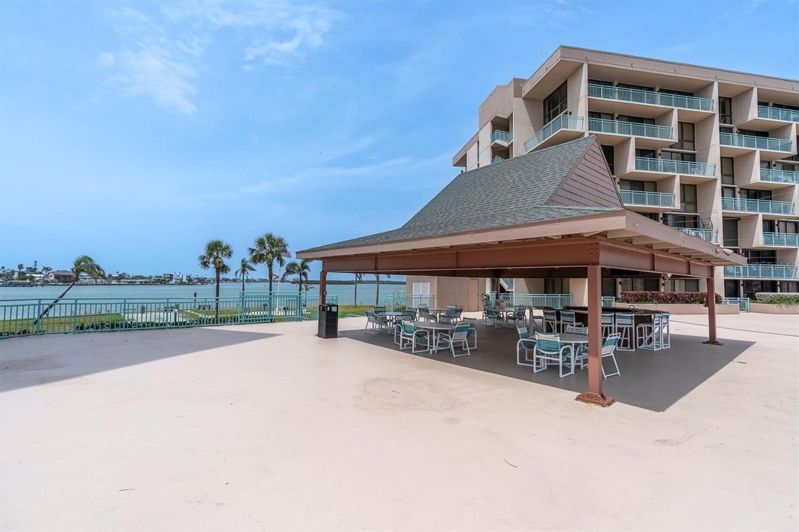 Tiki Hut with icemaker, water and wetbar... cool SHADE and Al Fresco Dining Options around the Plaza Deck ... POOL and SPA area adjacent... ALL IMMEDIATELY ACCESSIBLE from your  Private TERRACE / Balcony