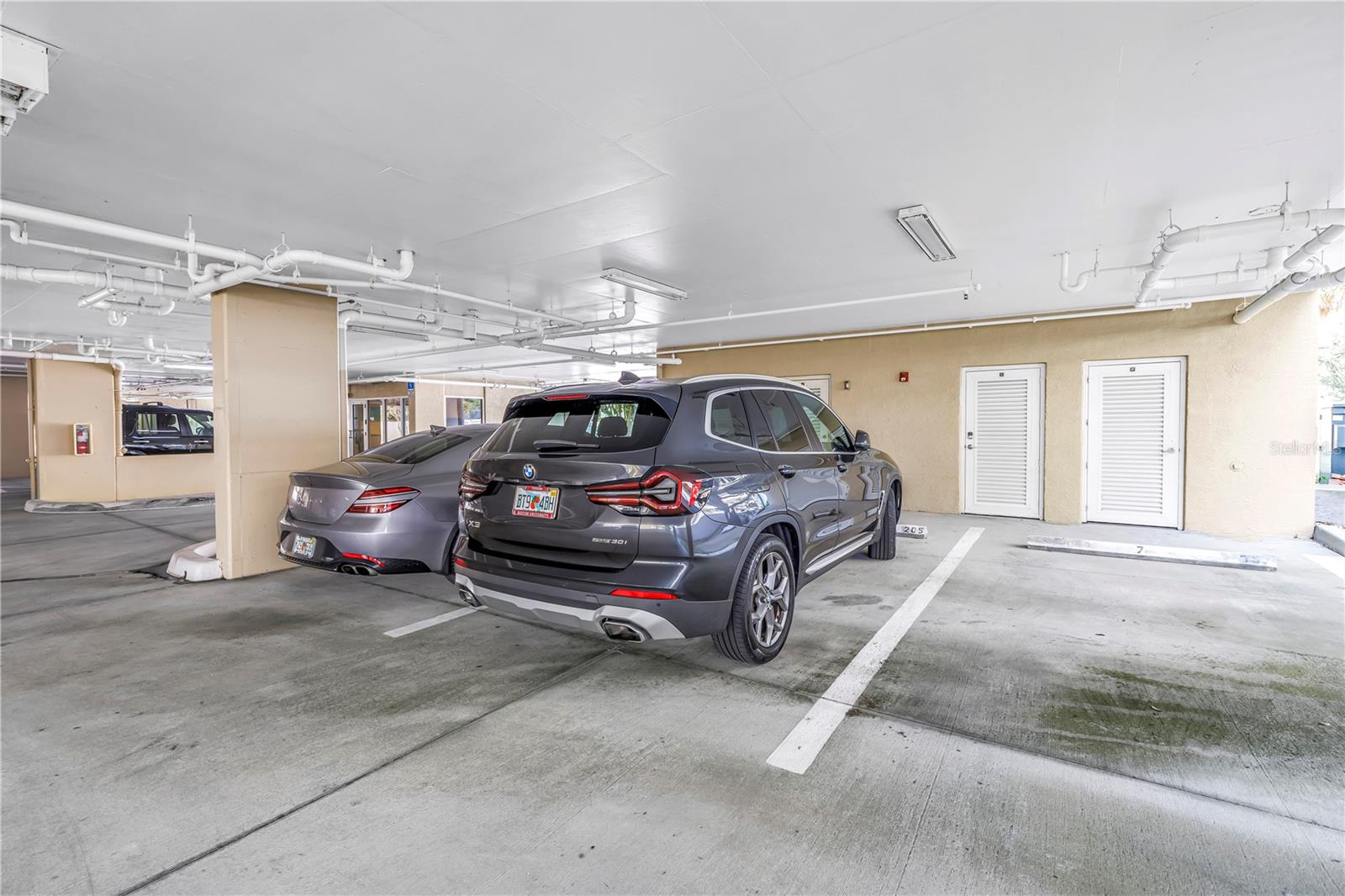 Designated Under building parking space #205