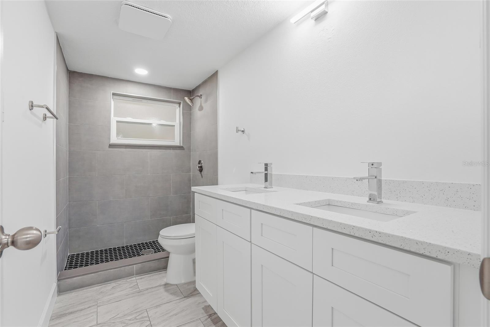 Guest Bathroom, mirror getting installed 3/28