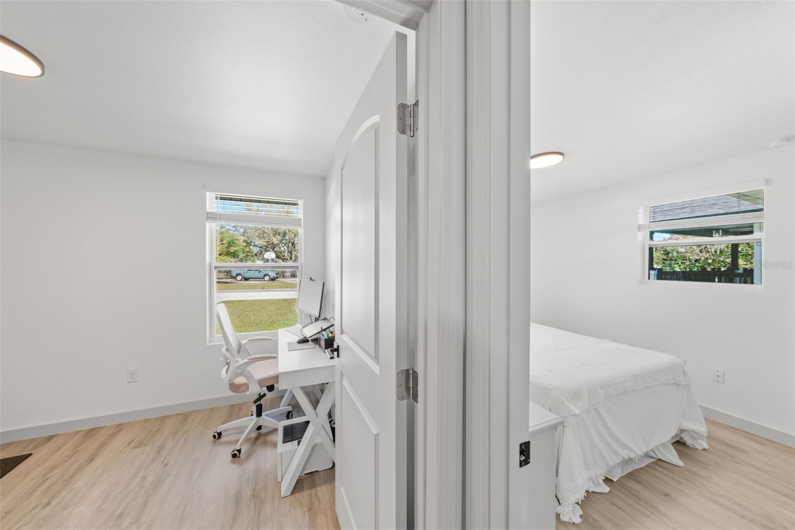 Down the hall are two secondary bedrooms