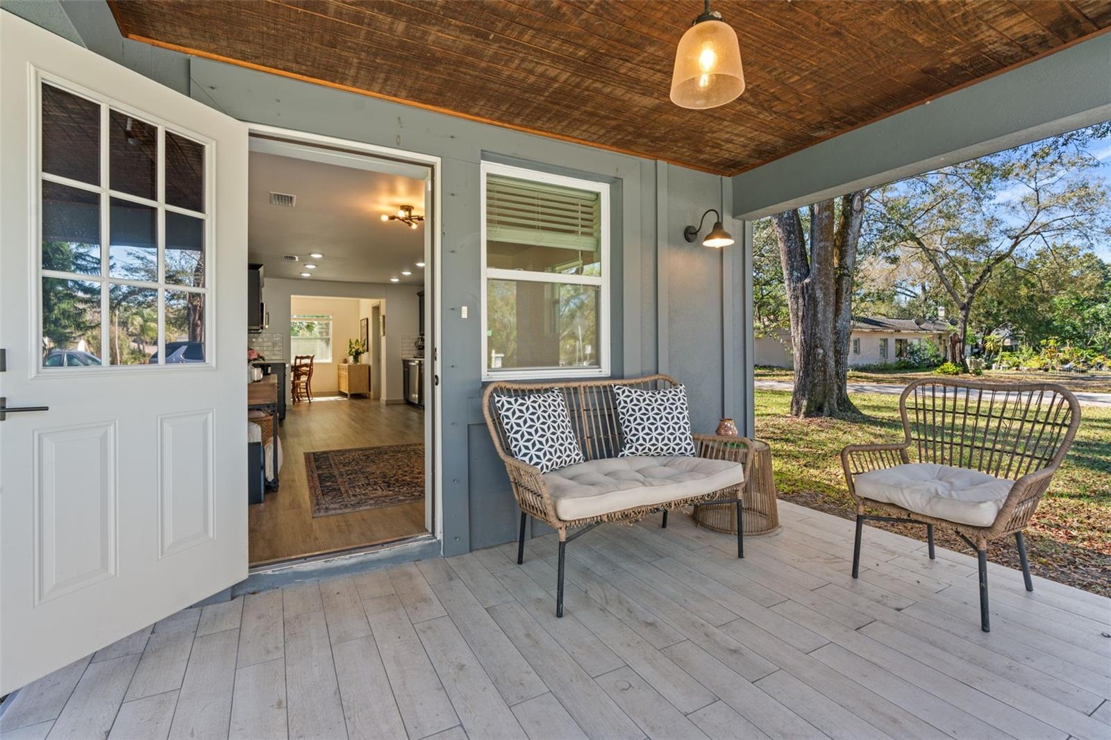 Note the special touches like a tongue and groove ceiling on the porch