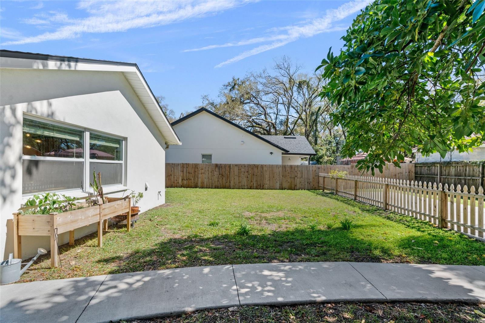 The back yard is huge!  And offers plenty of outdoor living opportunities!