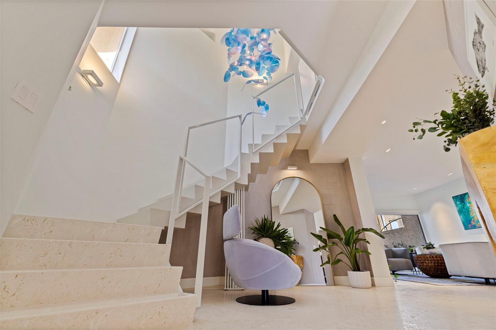 custom stair rails that can be open as shown or filled in with panels kept in storage.