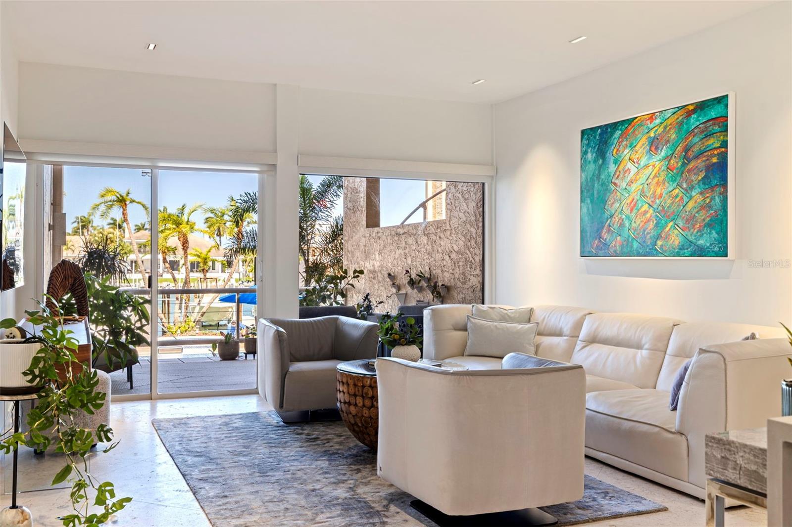 Stunning western facing view with remote controlled blinds.