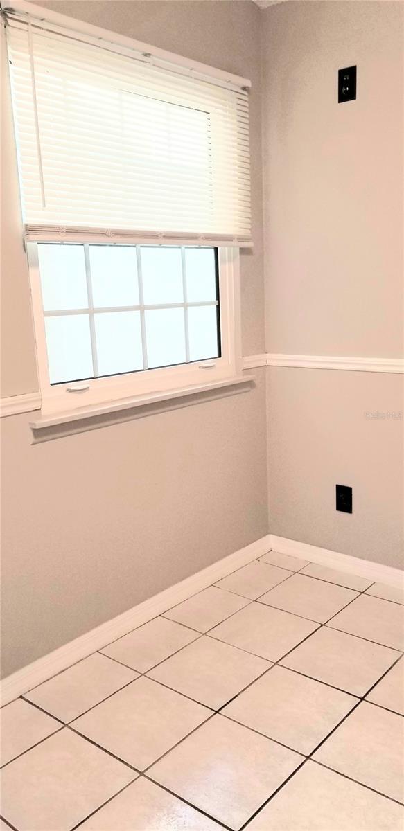 Eat in kitchen area with natural lighting