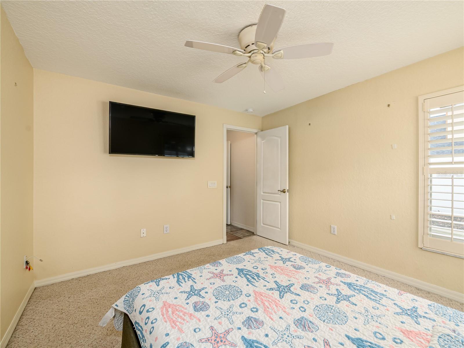 Bedroom #2 across from pool bath
