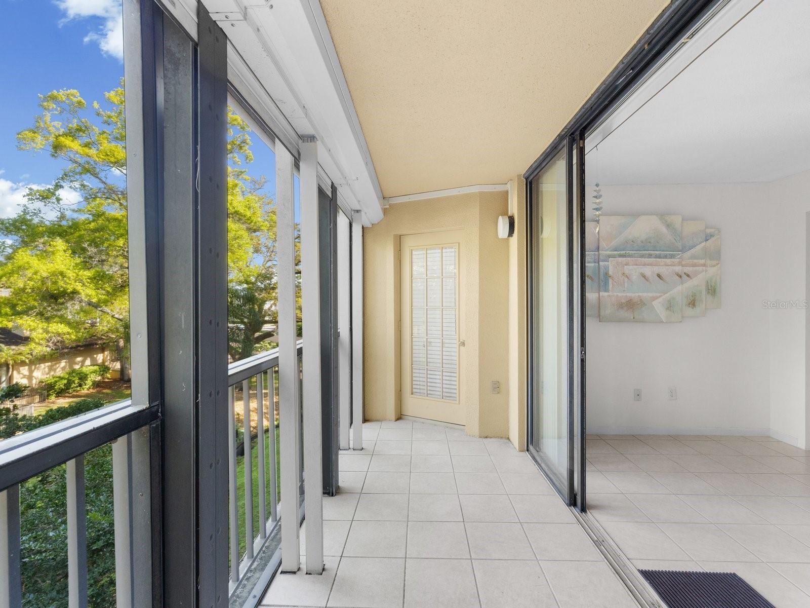 Bright patio with electric hurricane shutters