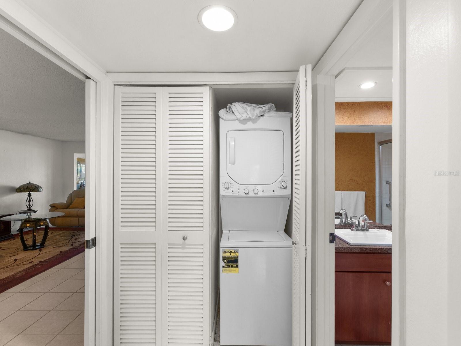 Washer Dryer tucked into hall closet