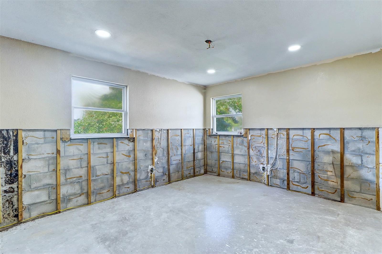 drywall was taken out after the storm but the seller had started remodeling the home prior to the storm so electrical was redone and plumbing, This is actually the master br