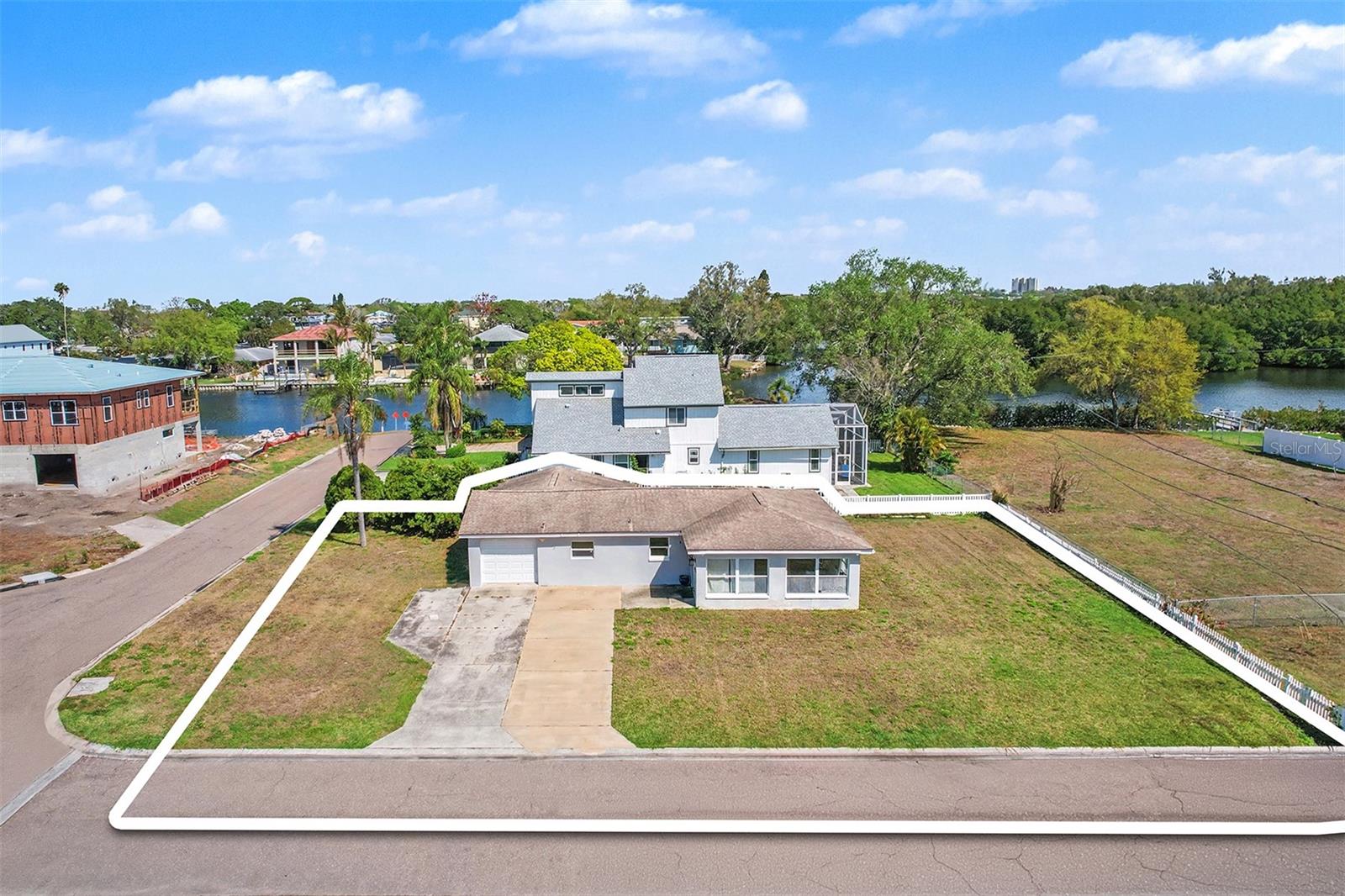 The markings are from the survey which shows that the seller actually owns 1/2 the street and the owner across the street owns the other 1/2.