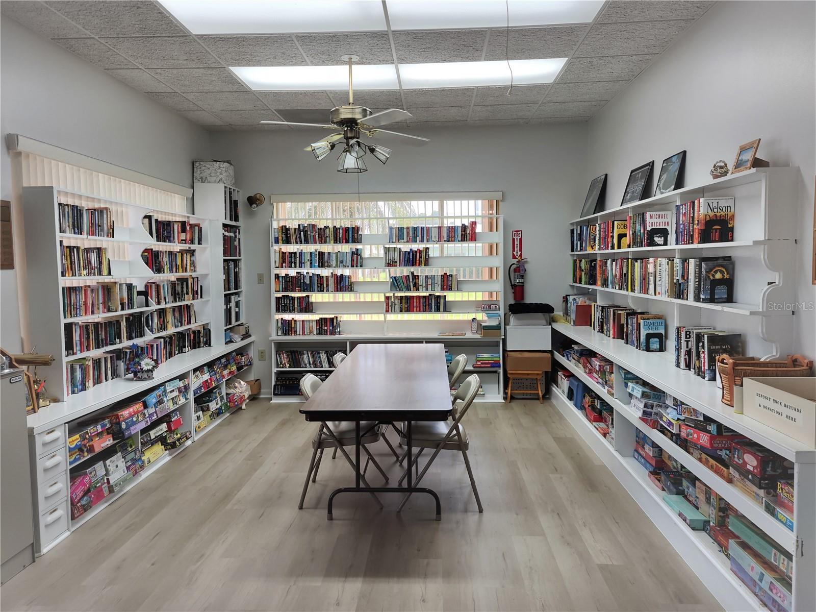 Library is on the honor system.  Book, puzzles and DVD's to take home and return when finished.