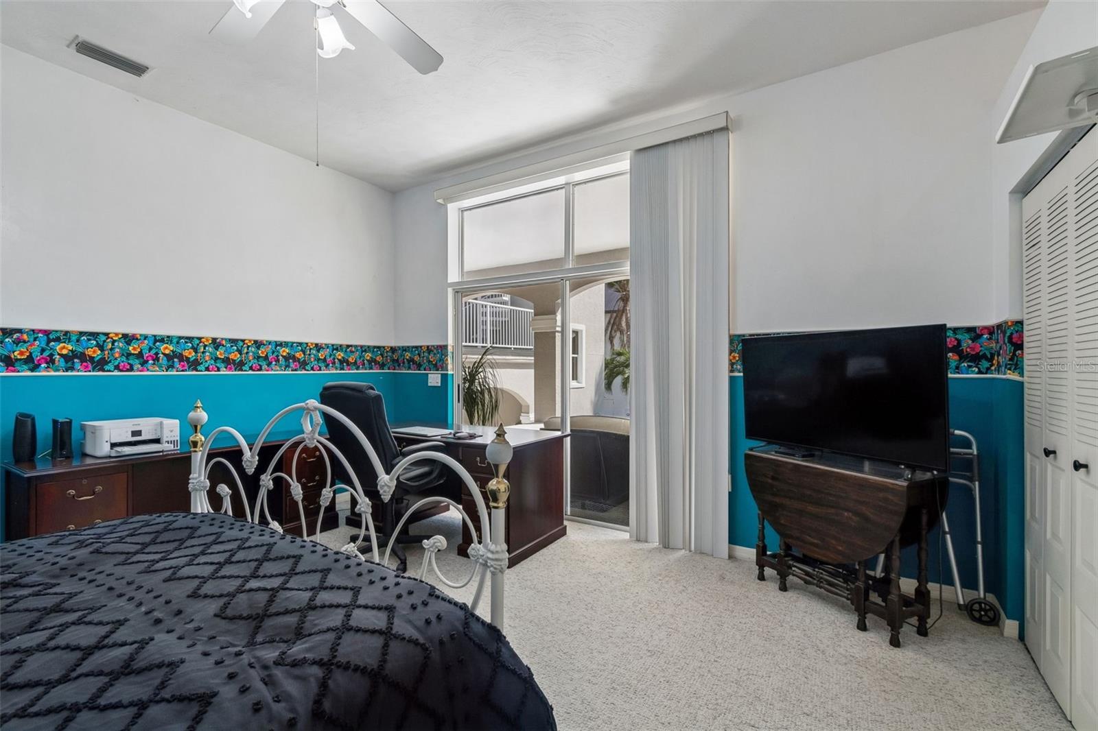 2nd Bedroom - Doors to Pool