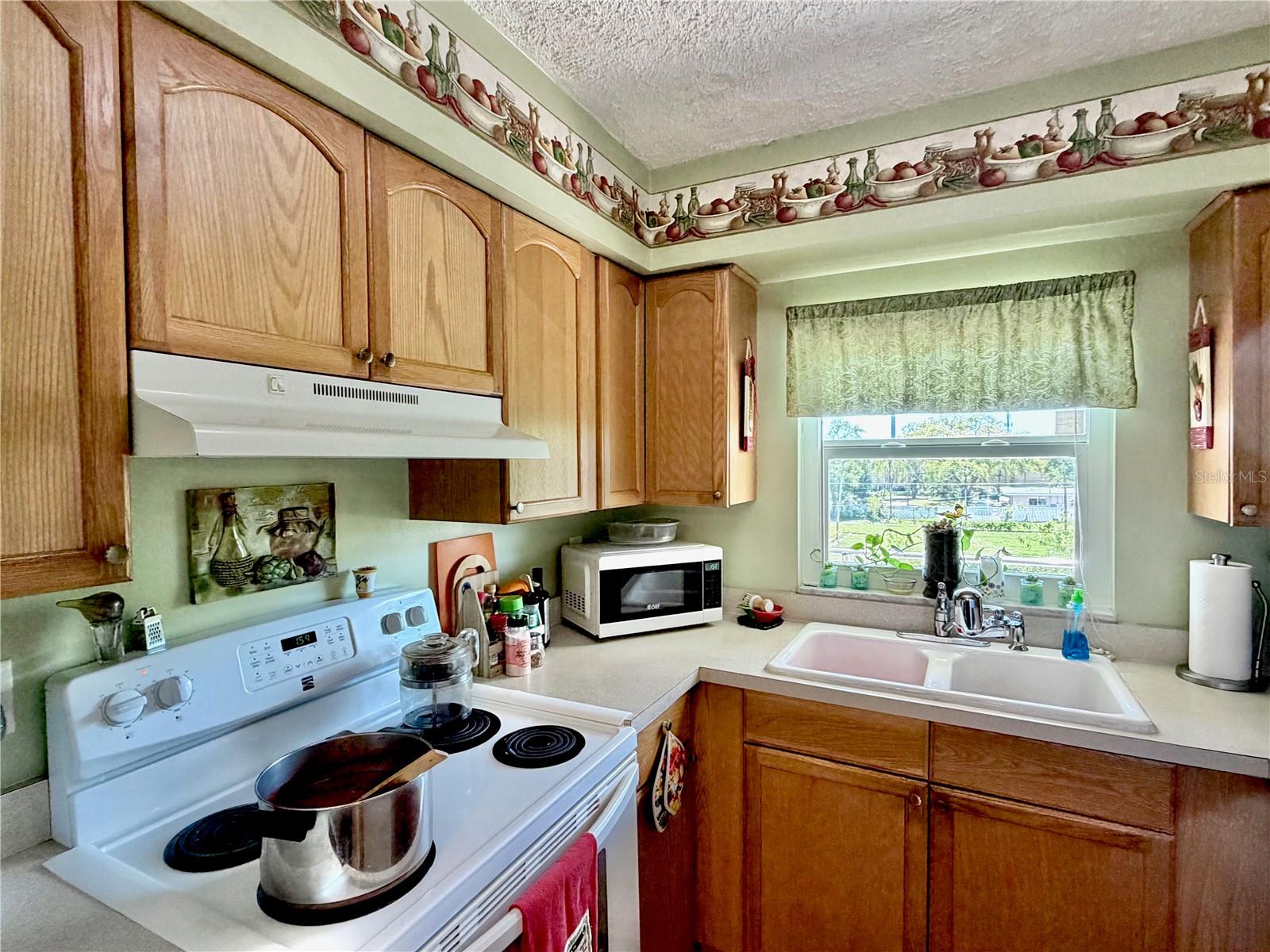 Kitchen - complete with homemade sauce cooking on the stove!