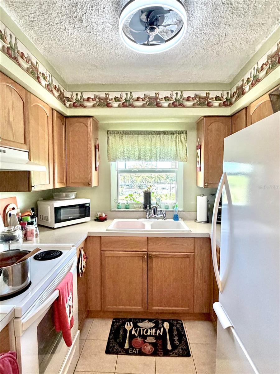 Kitchen with fandelier.