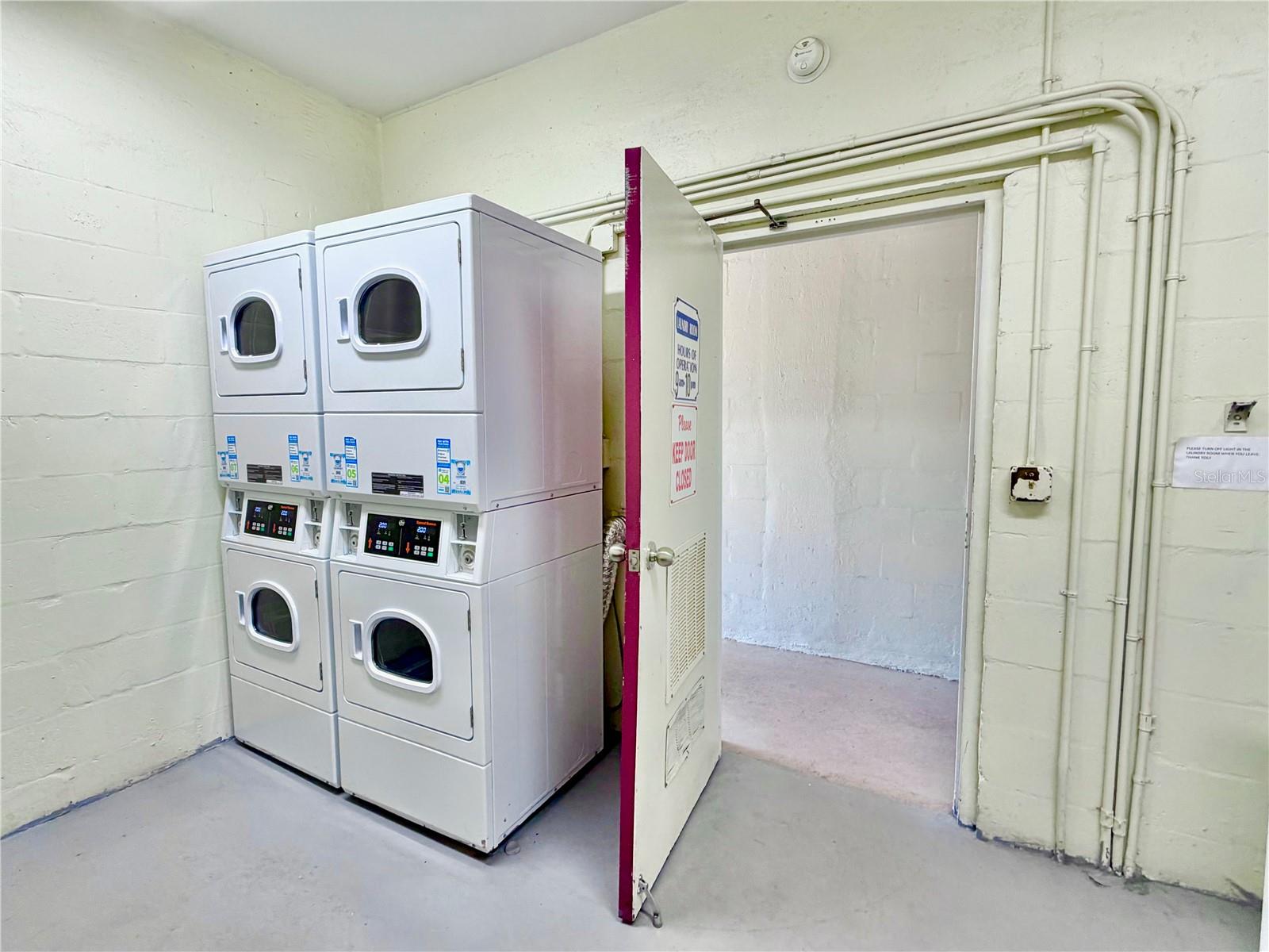Laundry room with brand new washers.