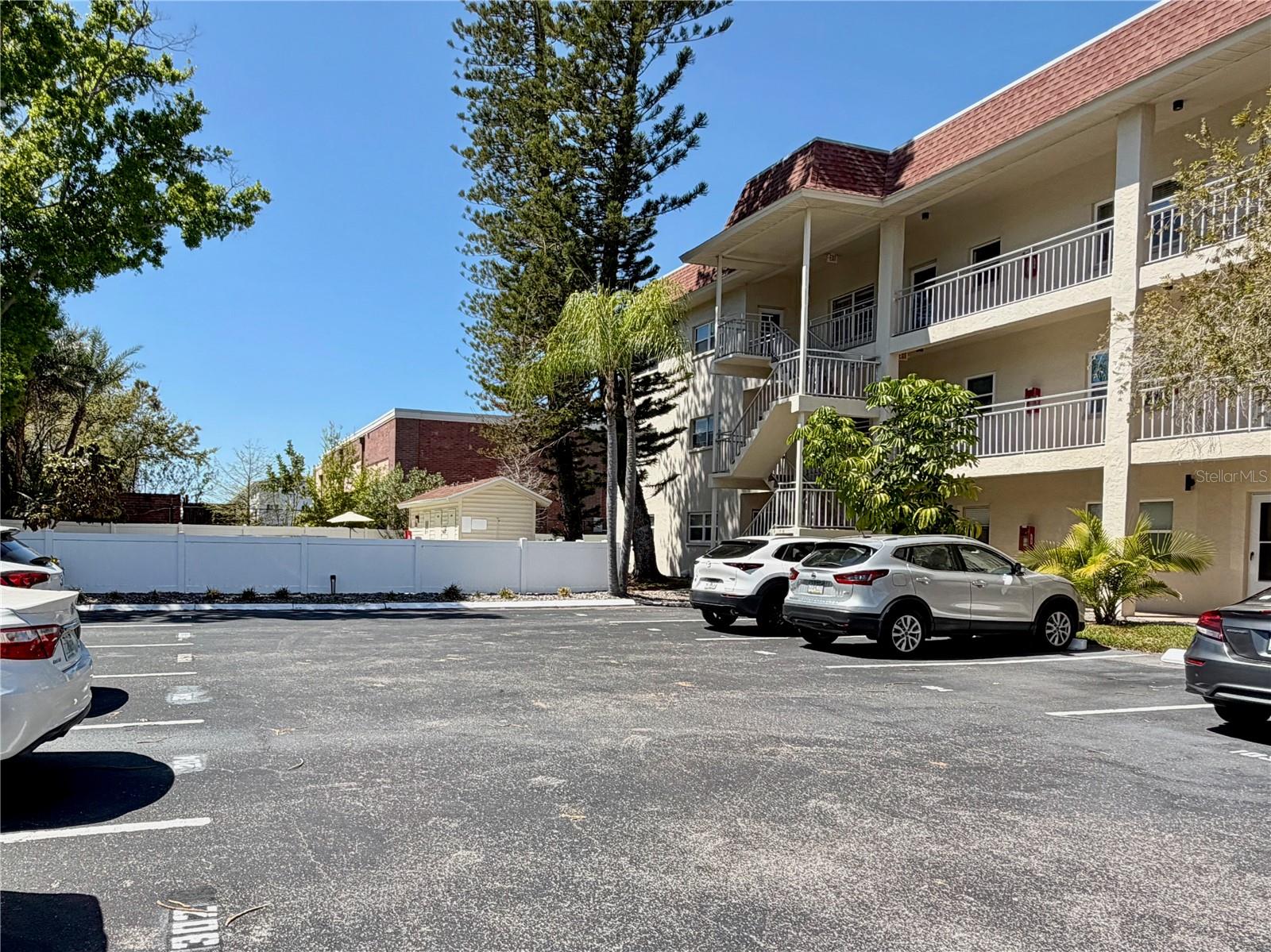 1 assigned space per unit & guest parking.