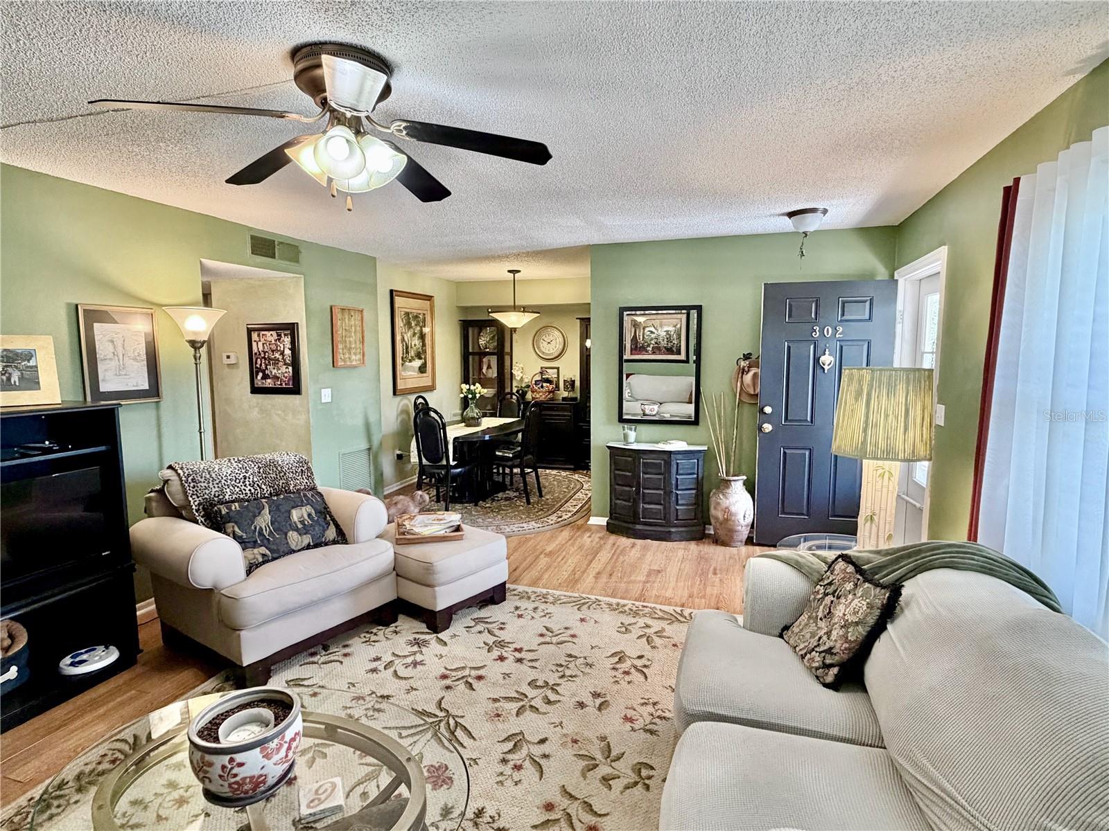 Living room, looking toward dining room.