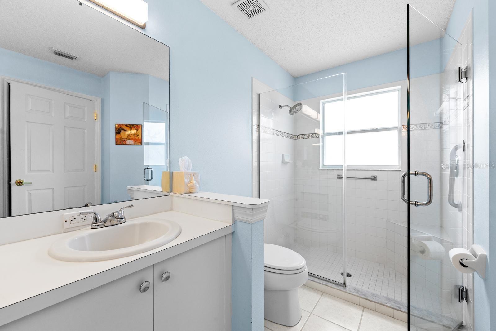 Step-in glass shower