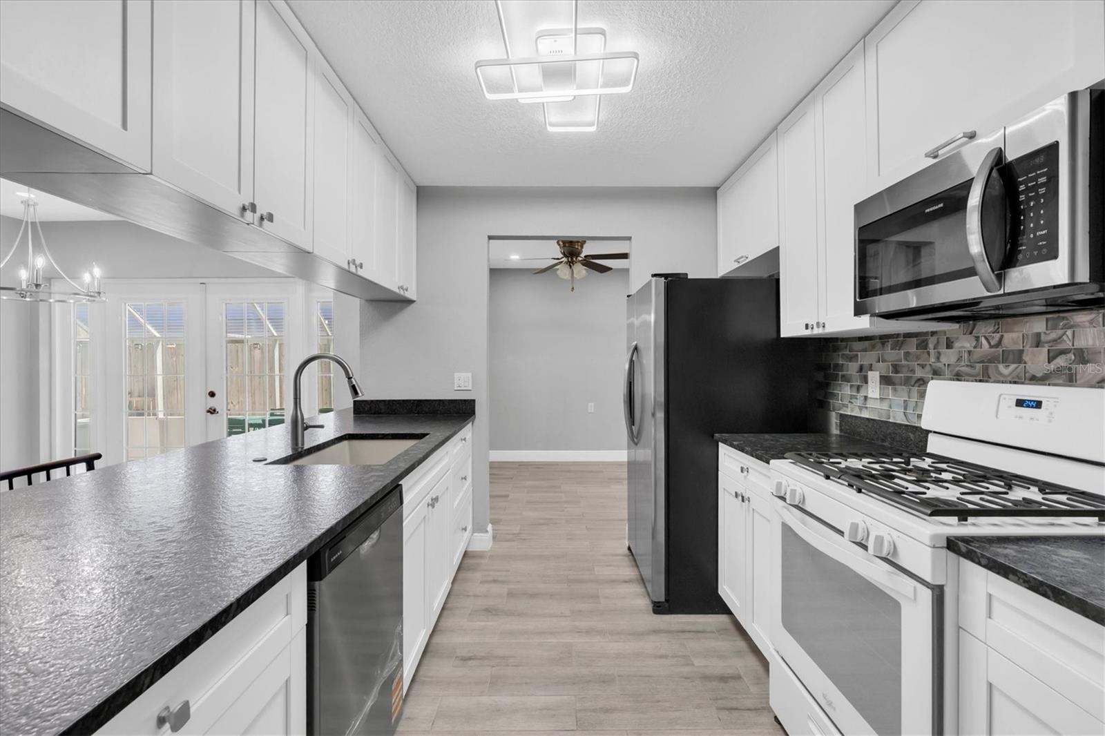 Nice and bright. Lots of counter and cabinet space