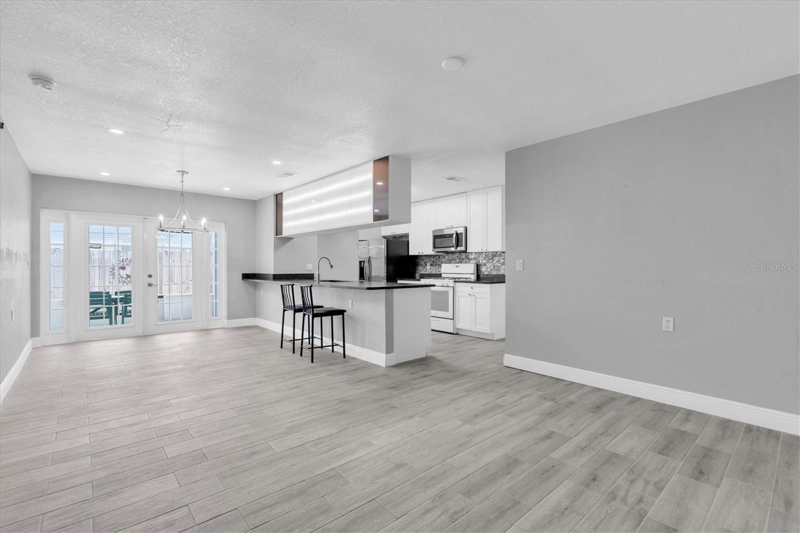 Dining room and Kitchen with patio entrance