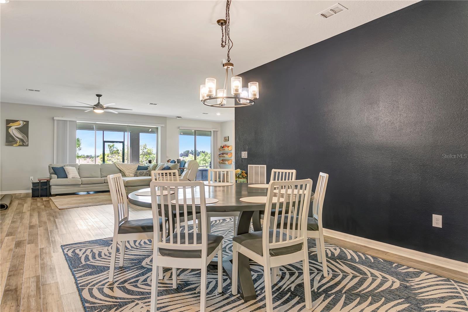 Dining space opens up to expansive great room