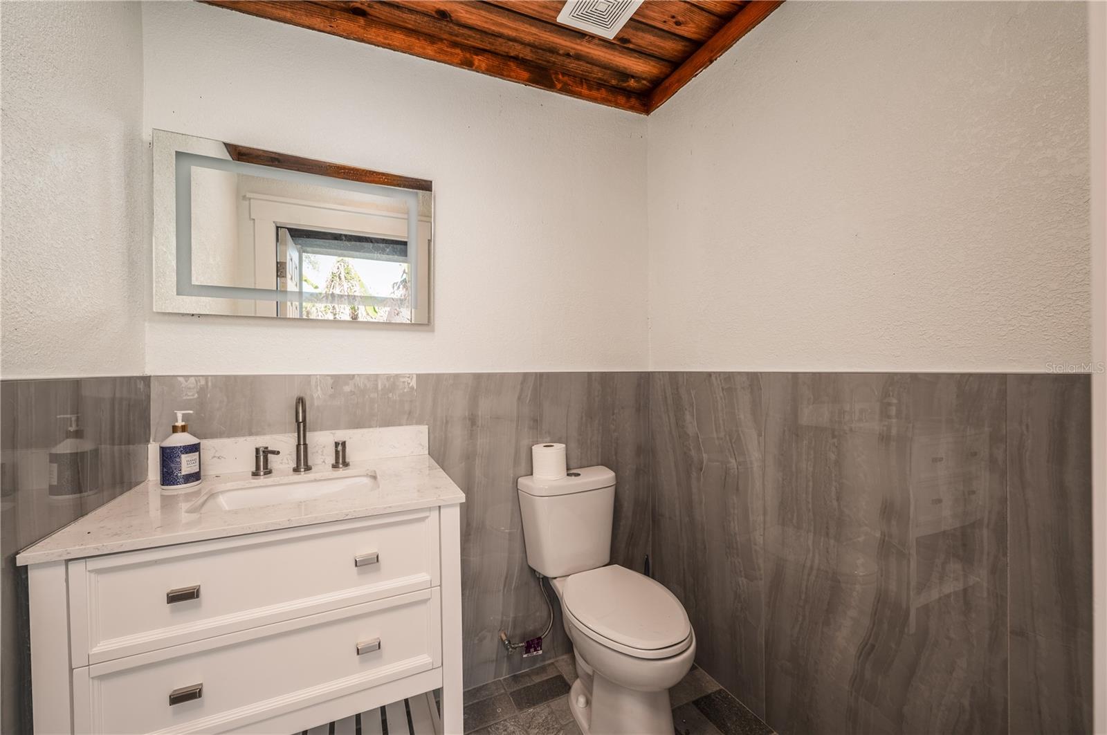 3rd bathroom off the outdoor kitchen