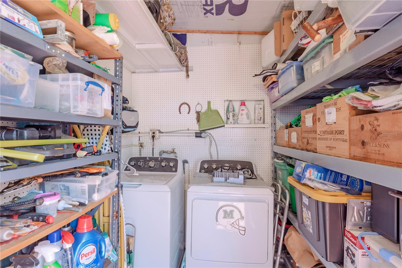 Laundry room with storage.