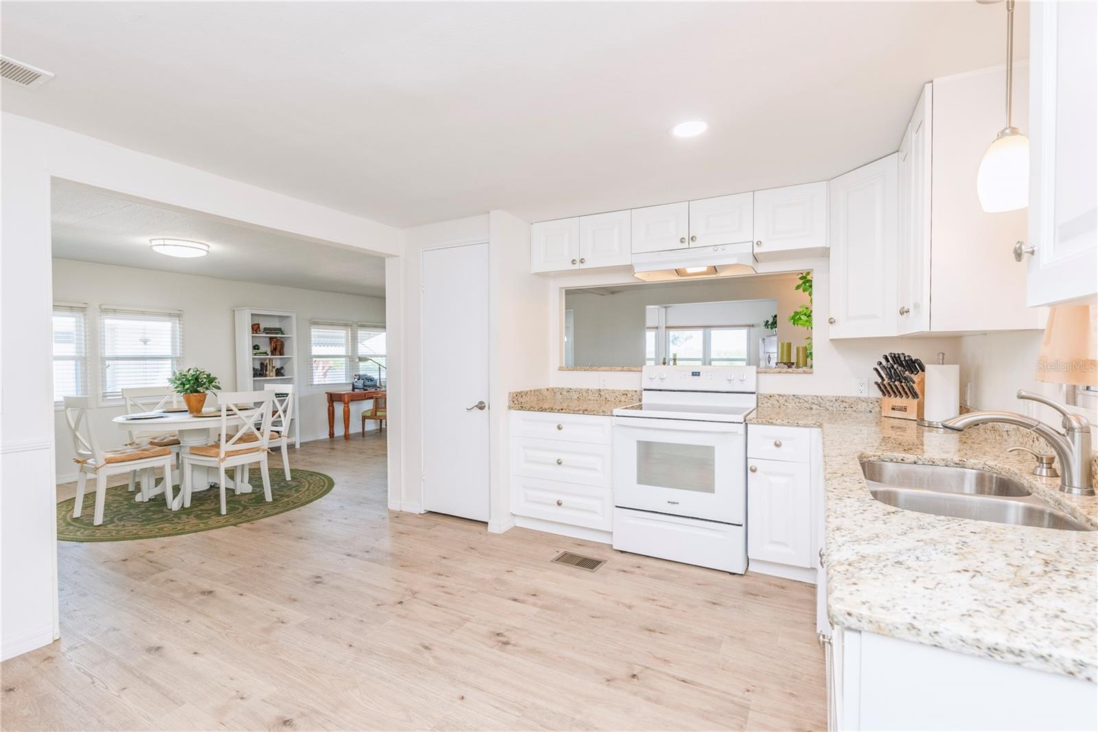 Kitchen is open to the dining room.